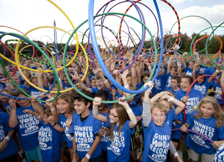 The Largest Hula Hoop workout consisted of 221 students from Longleaf Elementary School (USA) in New Port Richey, Florida on 8 November 2011 as part of Guinness World Records Day 2011.
Futher info: The participants danced for 1 minute 44 seconds.
Photo Credit: Matt May/Guinness World Records